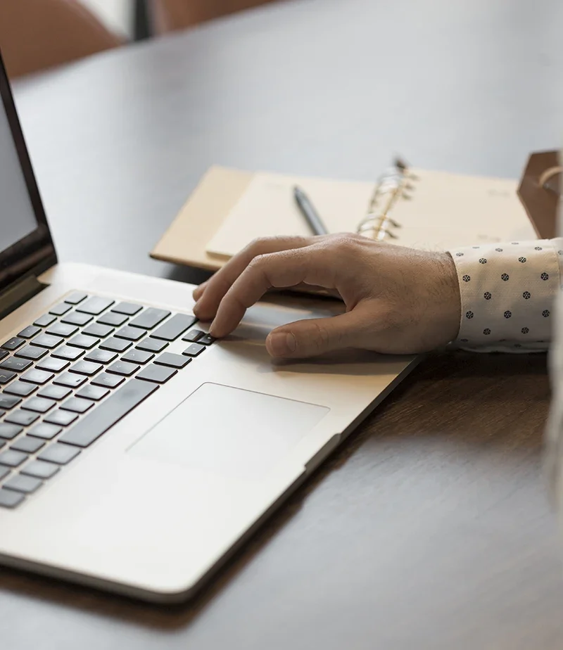 Hand with a laptop